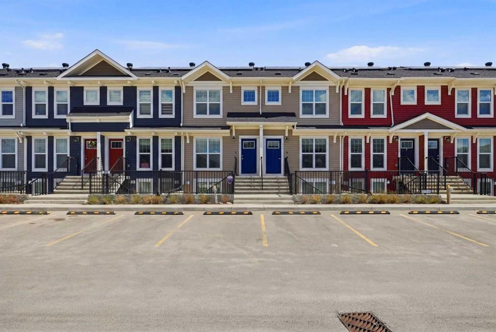 1322-7451 Falconridge Boulevard Ne, Calgary, AB - Outdoor With Facade