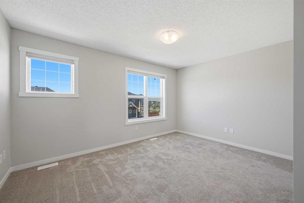 1322-7451 Falconridge Boulevard Ne, Calgary, AB - Indoor Photo Showing Other Room