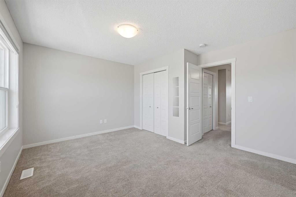 1322-7451 Falconridge Boulevard Ne, Calgary, AB - Indoor Photo Showing Other Room