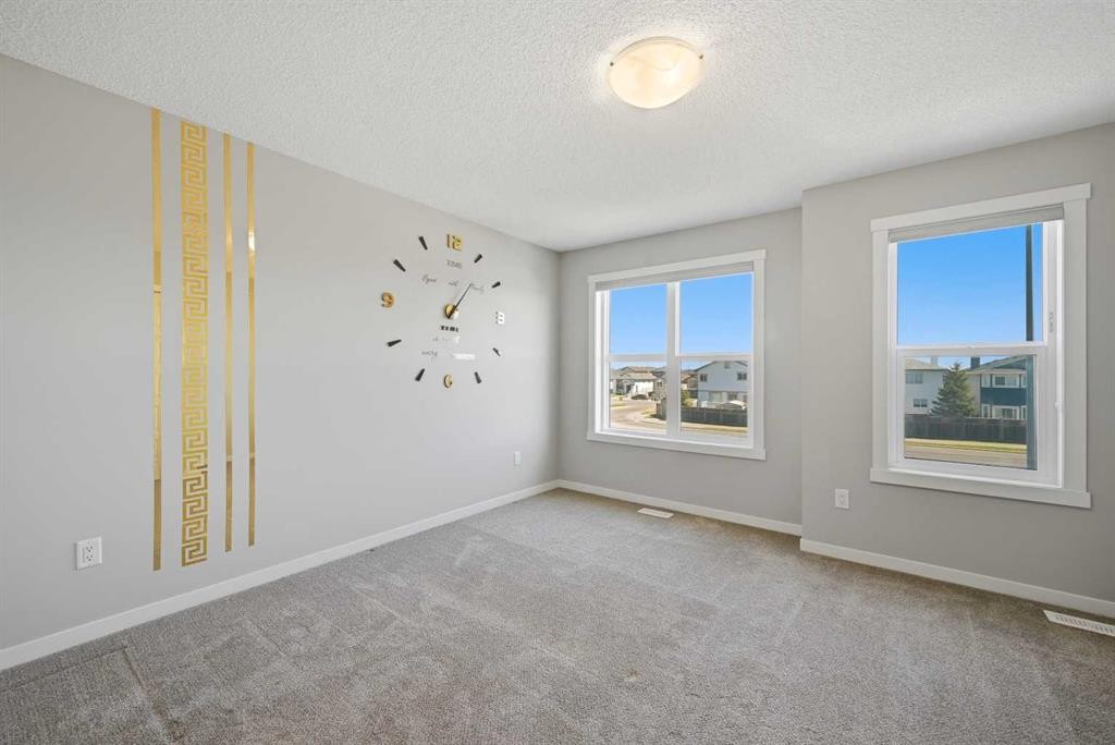 1322-7451 Falconridge Boulevard Ne, Calgary, AB - Indoor Photo Showing Other Room