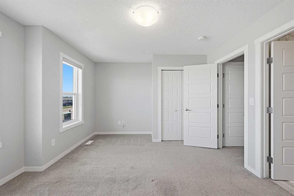 1322-7451 Falconridge Boulevard Ne, Calgary, AB - Indoor Photo Showing Other Room