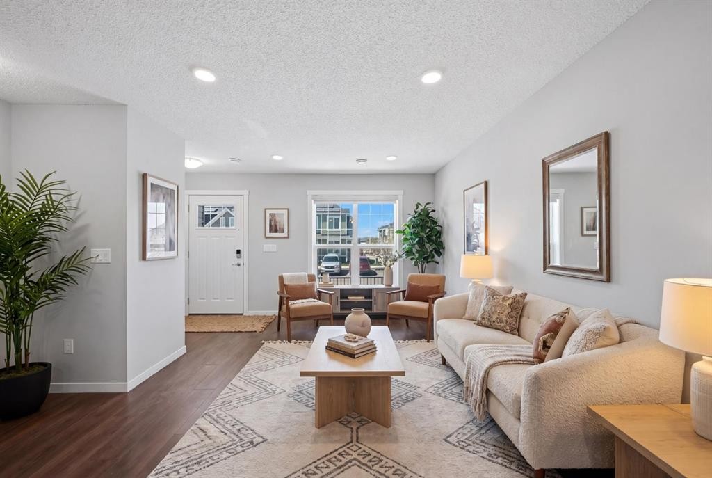 1322-7451 Falconridge Boulevard Ne, Calgary, AB - Indoor Photo Showing Living Room