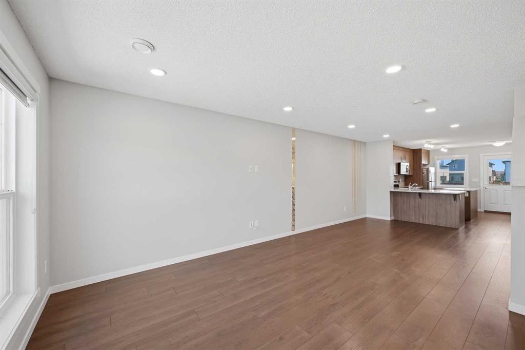 1322-7451 Falconridge Boulevard Ne, Calgary, AB - Indoor Photo Showing Other Room