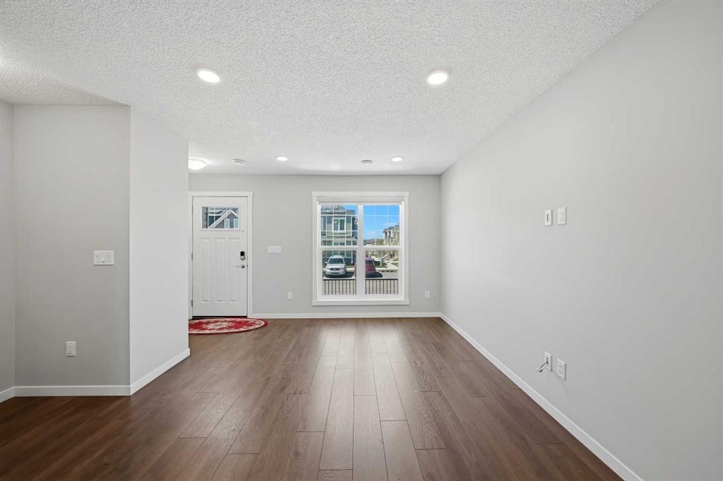 1322-7451 Falconridge Boulevard Ne, Calgary, AB - Indoor Photo Showing Other Room