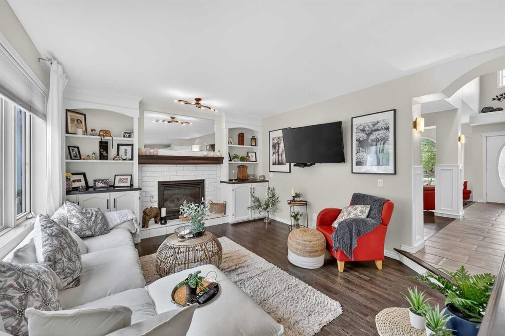 217 Mountain Park Drive Se, Calgary, AB - Indoor Photo Showing Living Room With Fireplace
