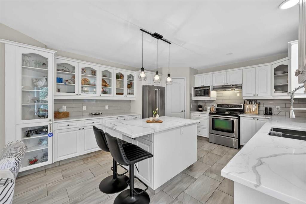 217 Mountain Park Drive Se, Calgary, AB - Indoor Photo Showing Kitchen With Stainless Steel Kitchen