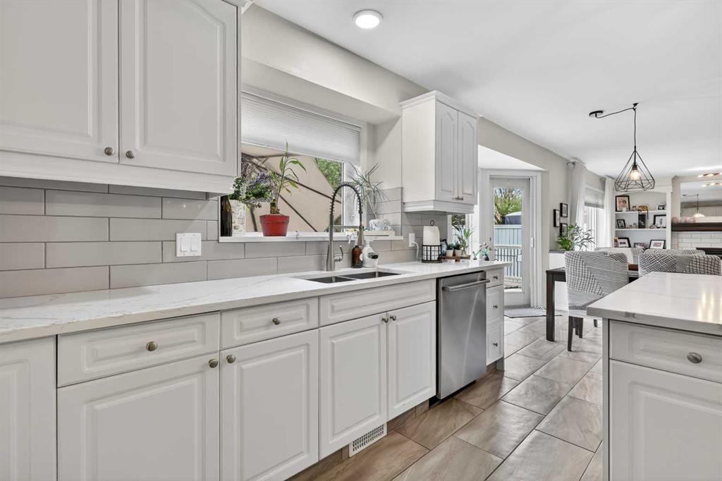 217 Mountain Park Drive Se, Calgary, AB - Indoor Photo Showing Kitchen With Double Sink