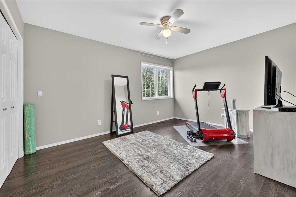 217 Mountain Park Drive Se, Calgary, AB - Indoor Photo Showing Gym Room