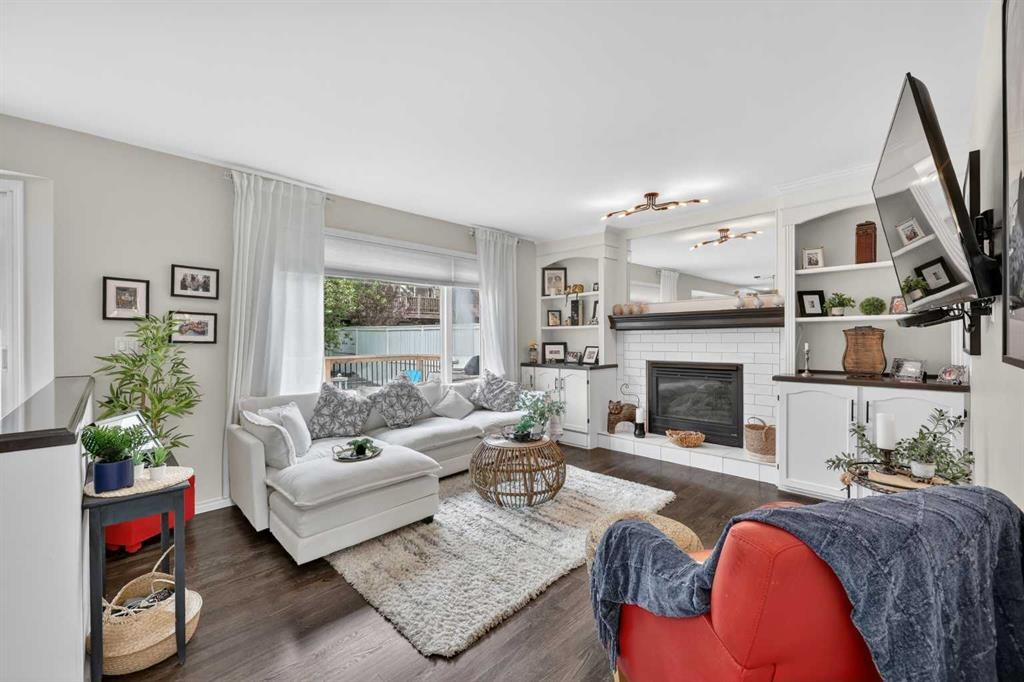 217 Mountain Park Drive Se, Calgary, AB - Indoor Photo Showing Living Room With Fireplace