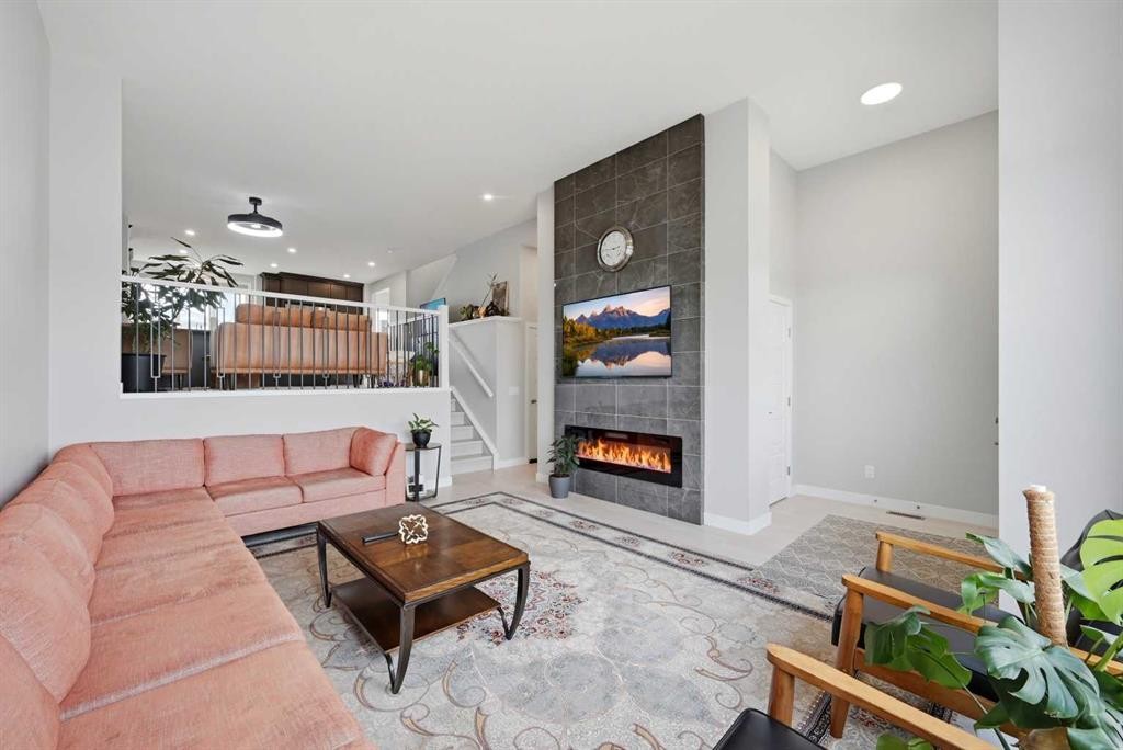 4065 Cornerstone Boulevard Ne, Calgary, AB - Indoor Photo Showing Living Room With Fireplace
