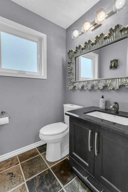 42 River Rock Green Se, Calgary, AB - Indoor Photo Showing Bathroom