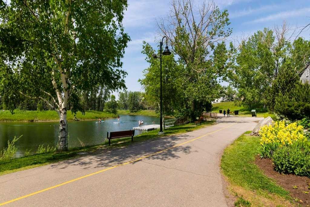 42 River Rock Green Se, Calgary, AB - Outdoor With Body Of Water With View