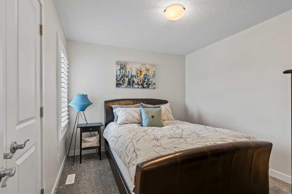68 Legacy Manor Se, Calgary, AB - Indoor Photo Showing Bedroom