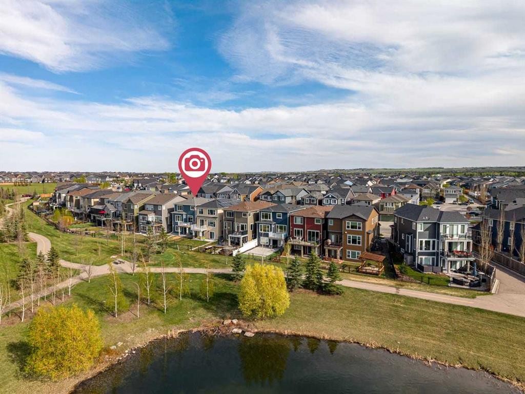 68 Legacy Manor Se, Calgary, AB - Outdoor With Body Of Water With View