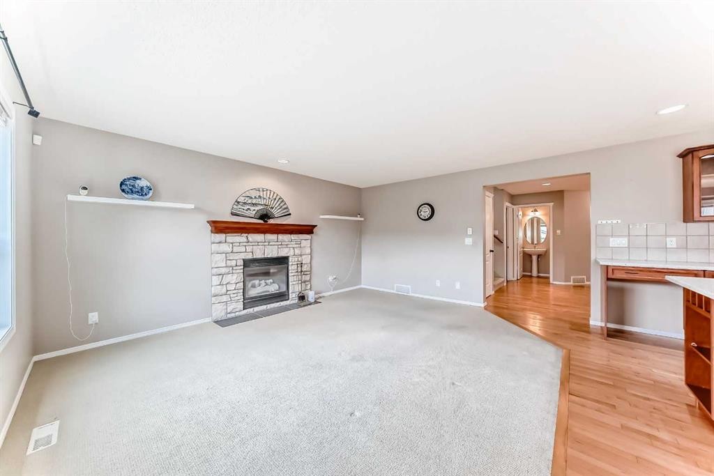 80 Eversyde Way Sw, Calgary, AB - Indoor With Fireplace