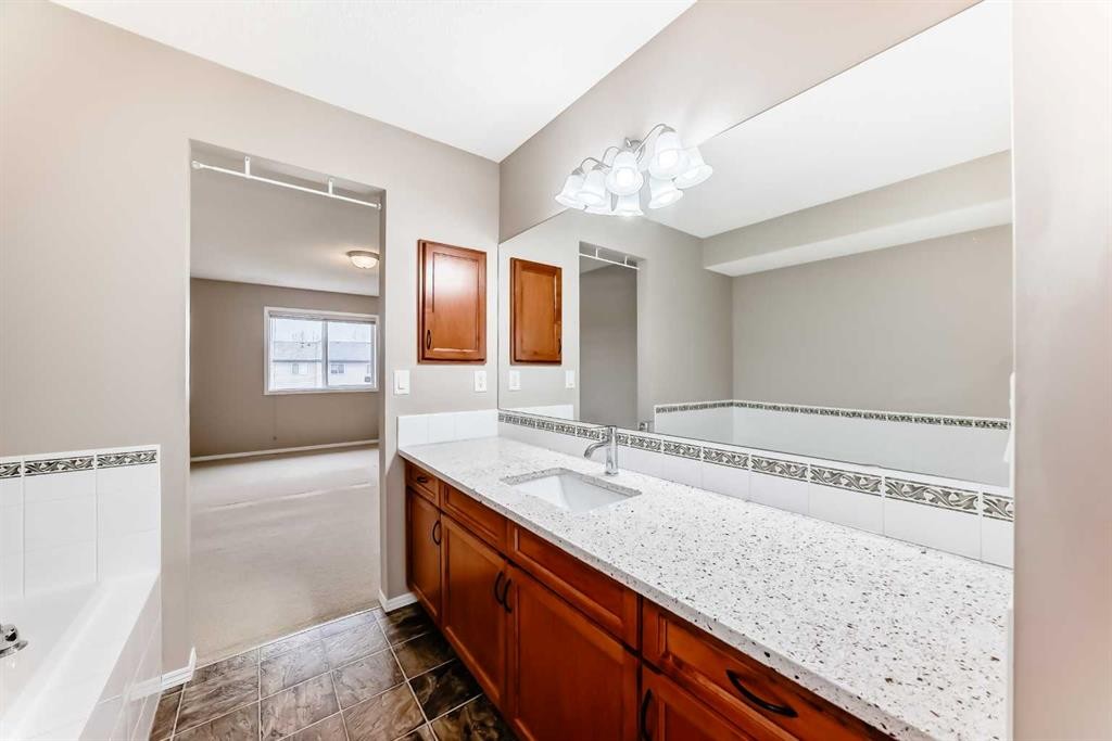 80 Eversyde Way Sw, Calgary, AB - Indoor Photo Showing Bathroom