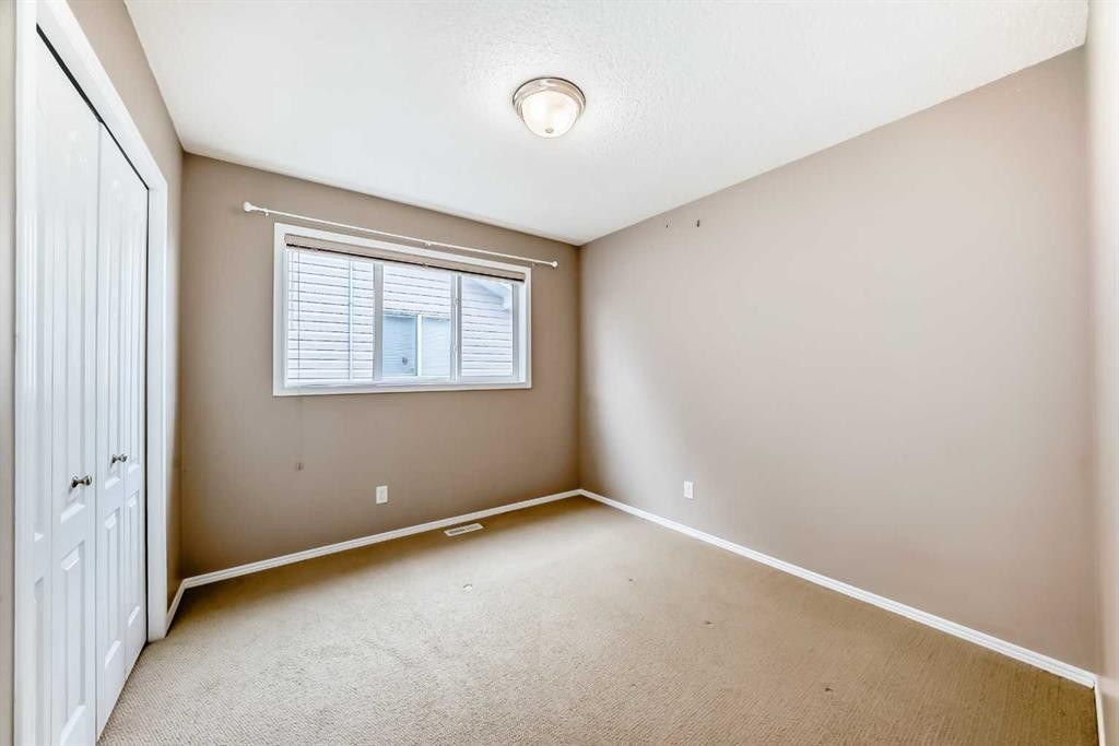 80 Eversyde Way Sw, Calgary, AB - Indoor Photo Showing Other Room