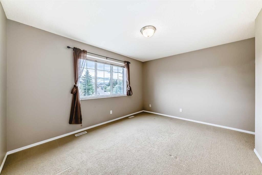 80 Eversyde Way Sw, Calgary, AB - Indoor Photo Showing Other Room