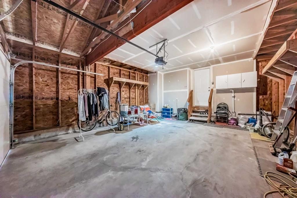 80 Eversyde Way Sw, Calgary, AB - Indoor Photo Showing Garage