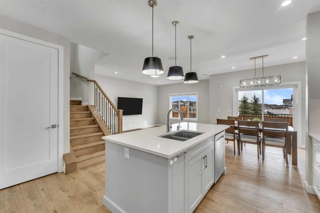 152 Savanna Way Ne, Calgary, AB - Indoor Photo Showing Kitchen With Double Sink