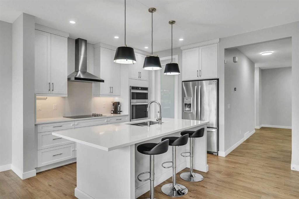 152 Savanna Way Ne, Calgary, AB - Indoor Photo Showing Kitchen With Double Sink With Upgraded Kitchen