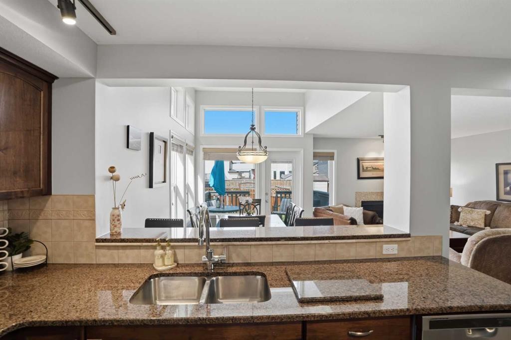 87 Bridlecrest Road Sw, Calgary, AB - Indoor Photo Showing Kitchen With Double Sink
