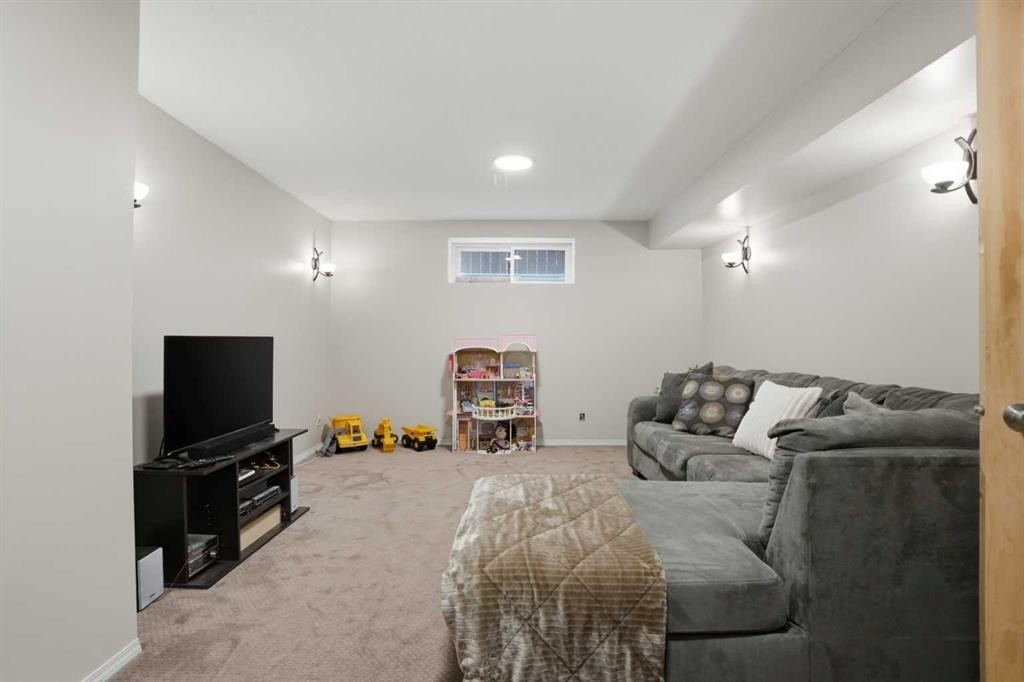 87 Bridlecrest Road Sw, Calgary, AB - Indoor Photo Showing Basement