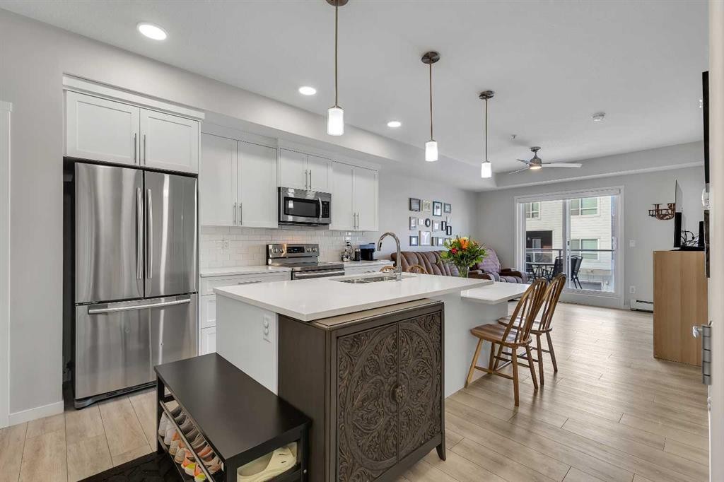 206-370 Harvest Hills Common Ne, Calgary, AB - Indoor Photo Showing Kitchen With Stainless Steel Kitchen With Upgraded Kitchen