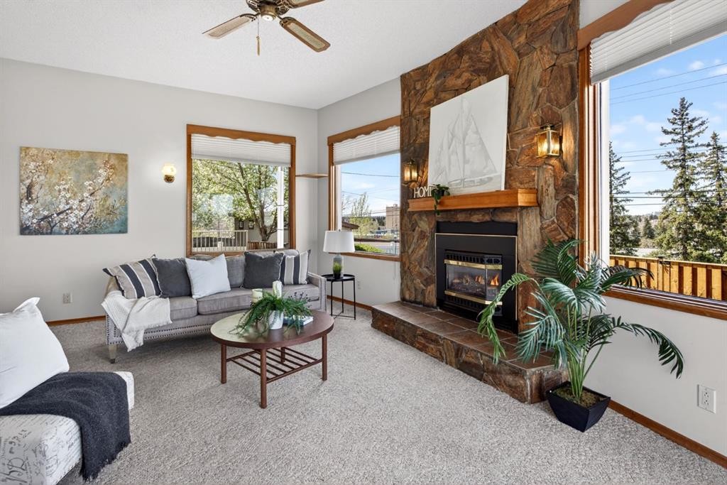 59 Fairview Drive Se, Calgary, AB - Indoor Photo Showing Living Room With Fireplace