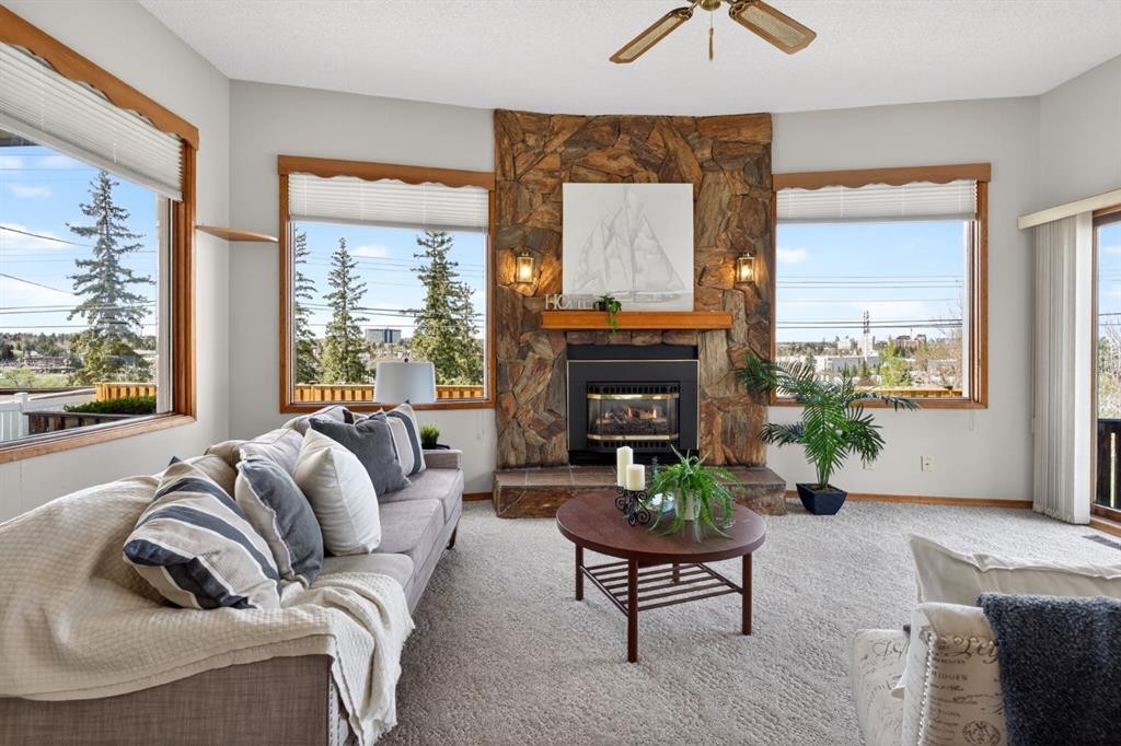 59 Fairview Drive Se, Calgary, AB - Indoor Photo Showing Living Room With Fireplace