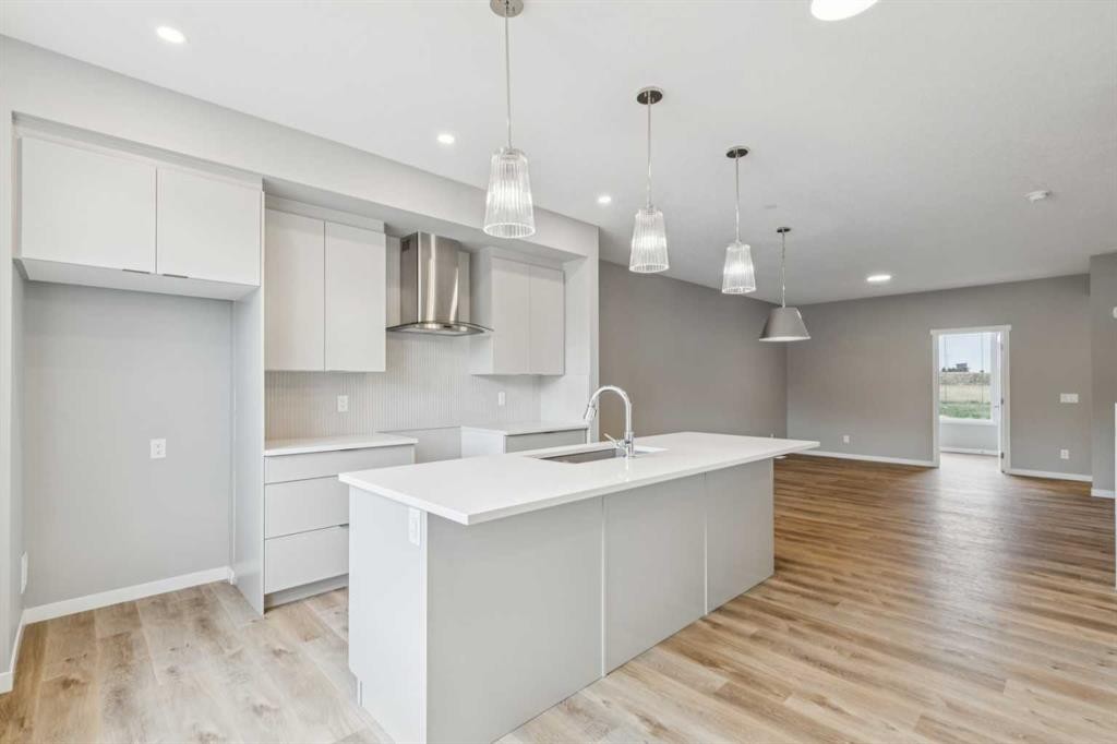 75 Hotchkiss Way Se, Calgary, AB - Indoor Photo Showing Kitchen With Upgraded Kitchen