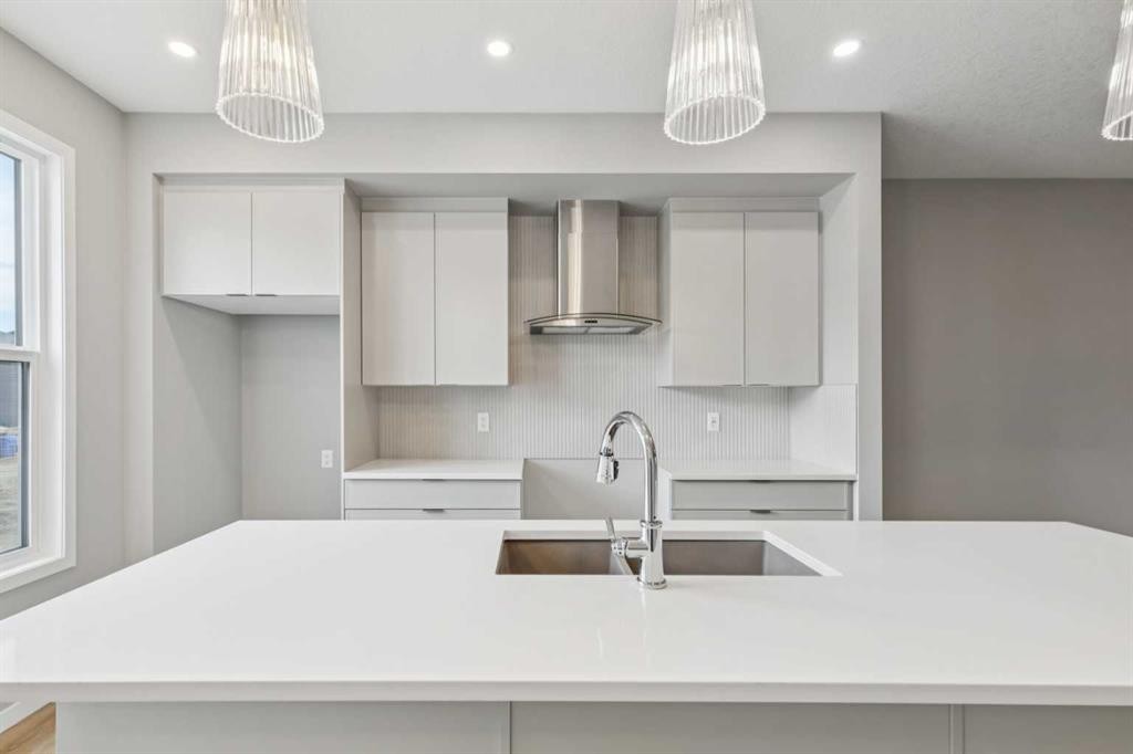 75 Hotchkiss Way Se, Calgary, AB - Indoor Photo Showing Kitchen With Upgraded Kitchen