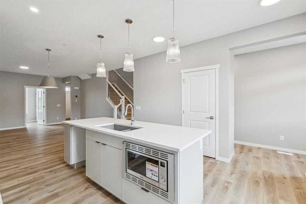 75 Hotchkiss Way Se, Calgary, AB - Indoor Photo Showing Kitchen With Upgraded Kitchen
