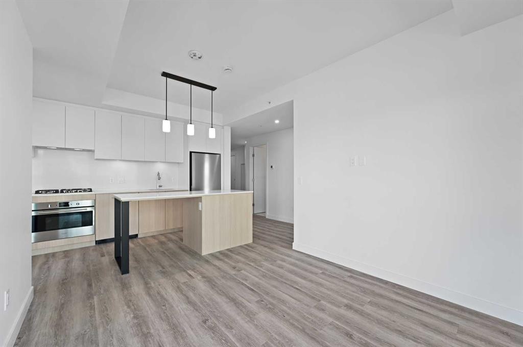 1102-730 2 Avenue Sw, Calgary, AB - Indoor Photo Showing Kitchen With Upgraded Kitchen