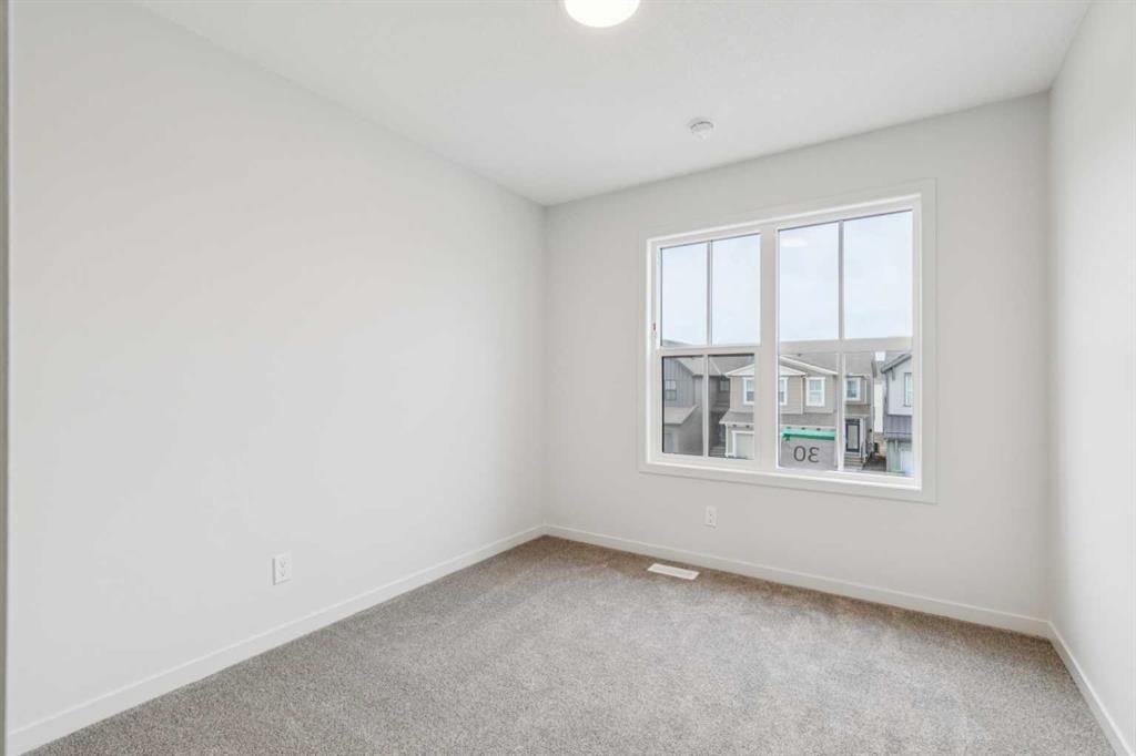 30 Bartlett Row Se, Calgary, AB - Indoor Photo Showing Other Room