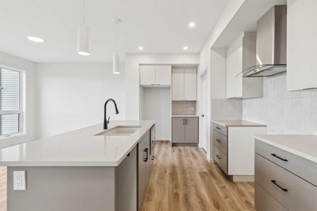 30 Bartlett Row Se, Calgary, AB - Indoor Photo Showing Kitchen With Double Sink
