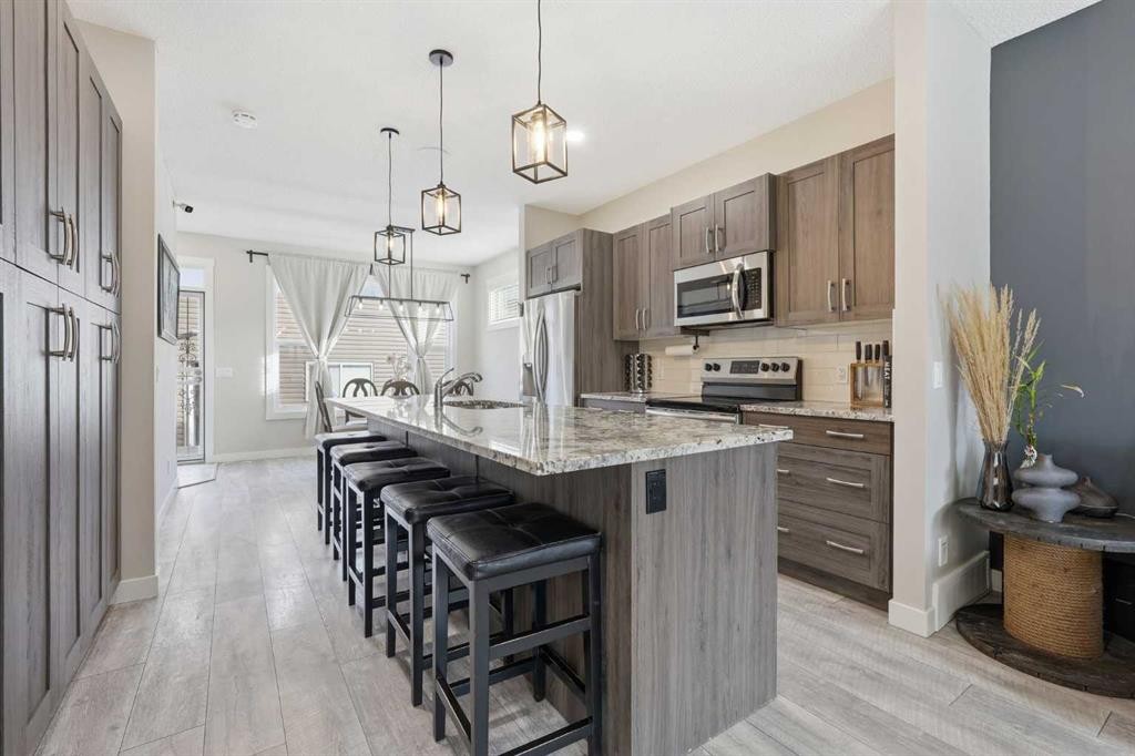 1071 Seton Circle Se, Calgary, AB - Indoor Photo Showing Kitchen With Upgraded Kitchen