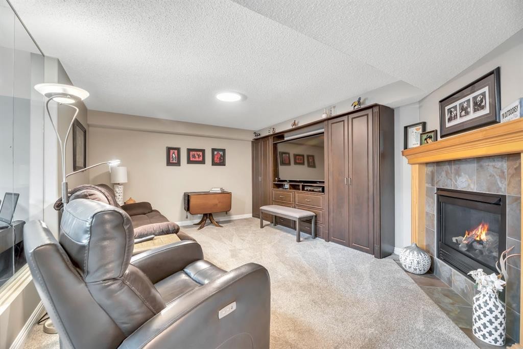 250 Prestwick Close Se, Calgary, AB - Indoor With Fireplace