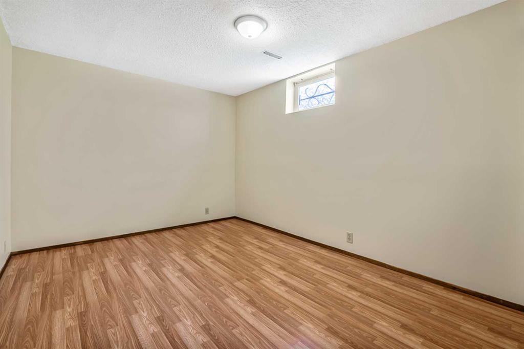27 Aberdare Crescent Ne, Calgary, AB - Indoor Photo Showing Other Room
