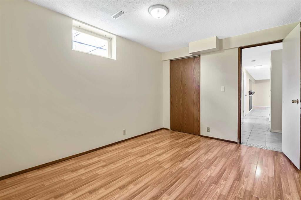 27 Aberdare Crescent Ne, Calgary, AB - Indoor Photo Showing Other Room