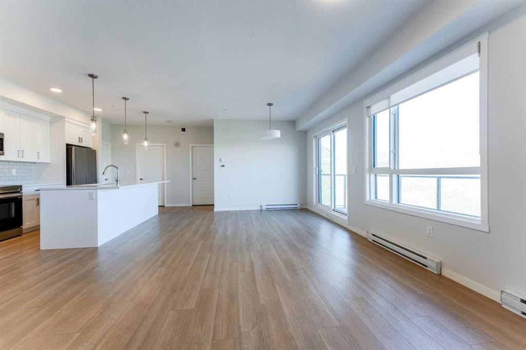 2410-42 Cranbrook Gardens Se, Calgary, AB - Indoor Photo Showing Kitchen With Upgraded Kitchen