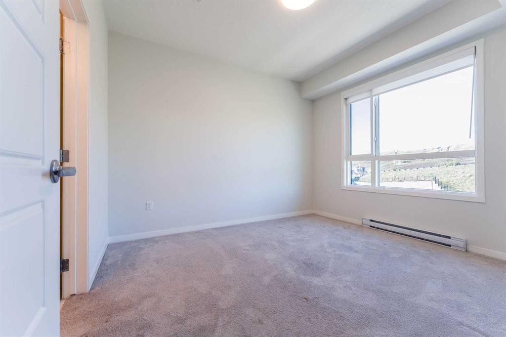 2410-42 Cranbrook Gardens Se, Calgary, AB - Indoor Photo Showing Other Room
