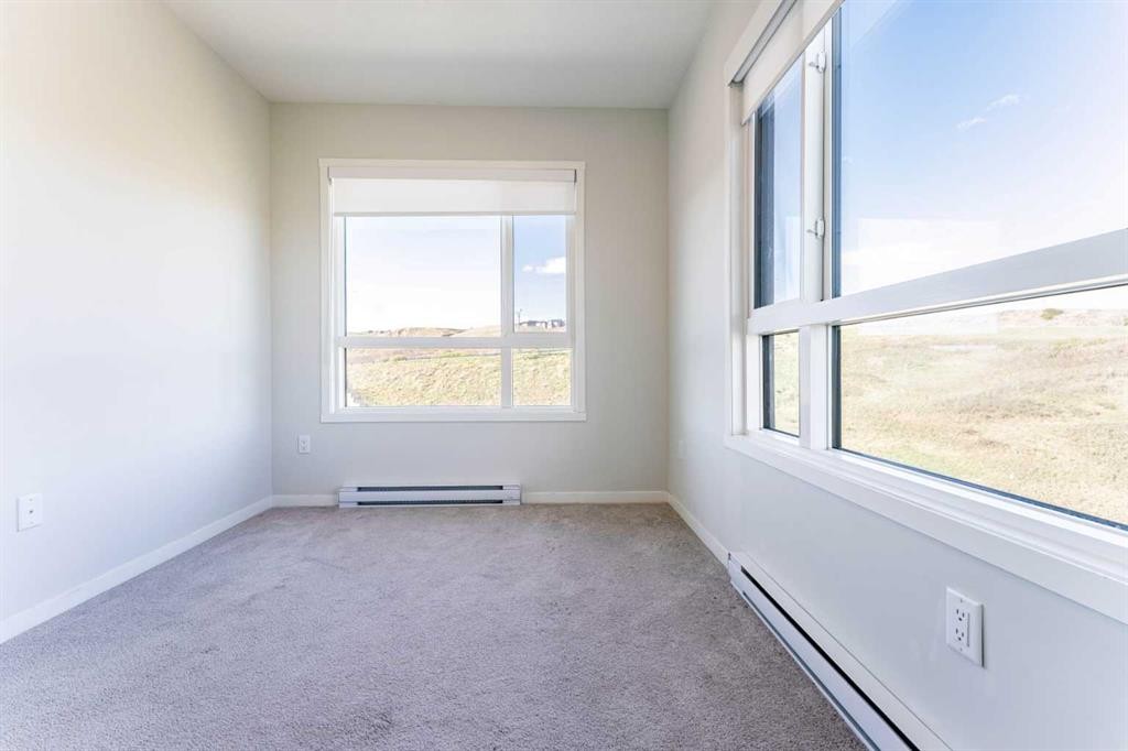 2410-42 Cranbrook Gardens Se, Calgary, AB - Indoor Photo Showing Other Room