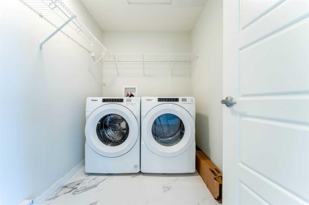 2410-42 Cranbrook Gardens Se, Calgary, AB - Indoor Photo Showing Laundry Room