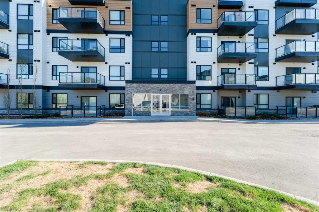 2410-42 Cranbrook Gardens Se, Calgary, AB - Outdoor With Balcony With Facade