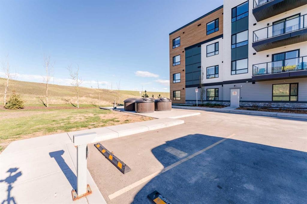 2410-42 Cranbrook Gardens Se, Calgary, AB - Outdoor With Balcony