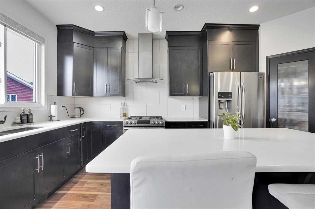 726 Redstone Drive Ne, Calgary, AB - Indoor Photo Showing Kitchen With Stainless Steel Kitchen
