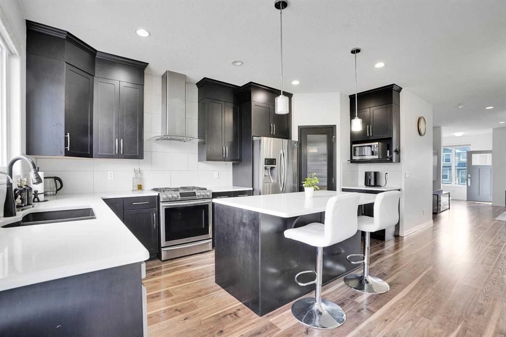 726 Redstone Drive Ne, Calgary, AB - Indoor Photo Showing Kitchen With Stainless Steel Kitchen With Double Sink With Upgraded Kitchen