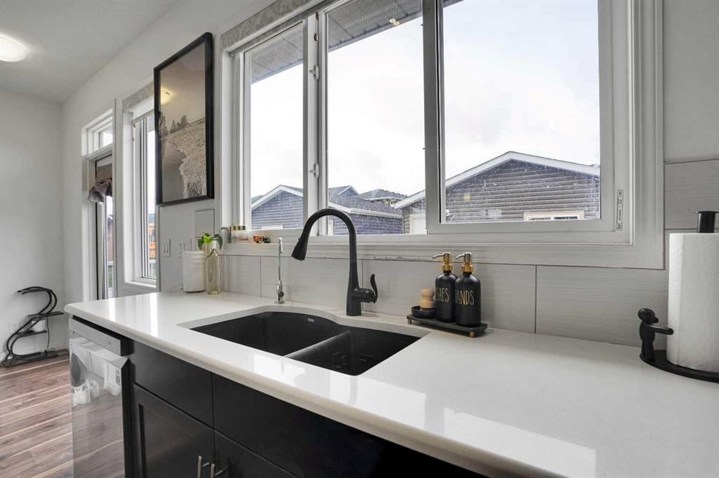 726 Redstone Drive Ne, Calgary, AB - Indoor Photo Showing Kitchen With Double Sink