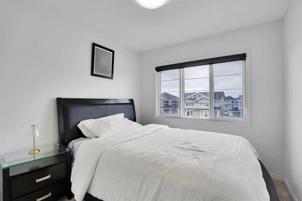 726 Redstone Drive Ne, Calgary, AB - Indoor Photo Showing Bedroom